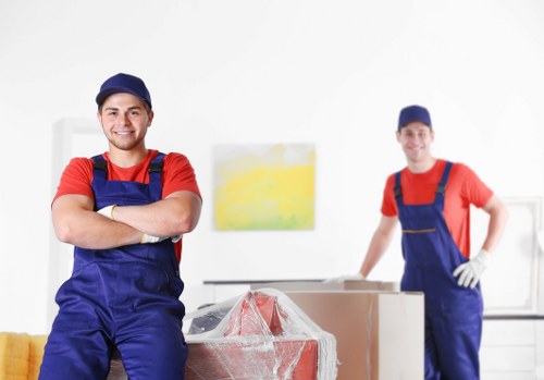 Professional man and van service supporting a Dalston business move