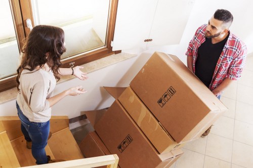 Packed boxes and furniture prepared for long-term storage in Dalston